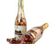 Belgické pralinky Marc de Champagne v lahvi